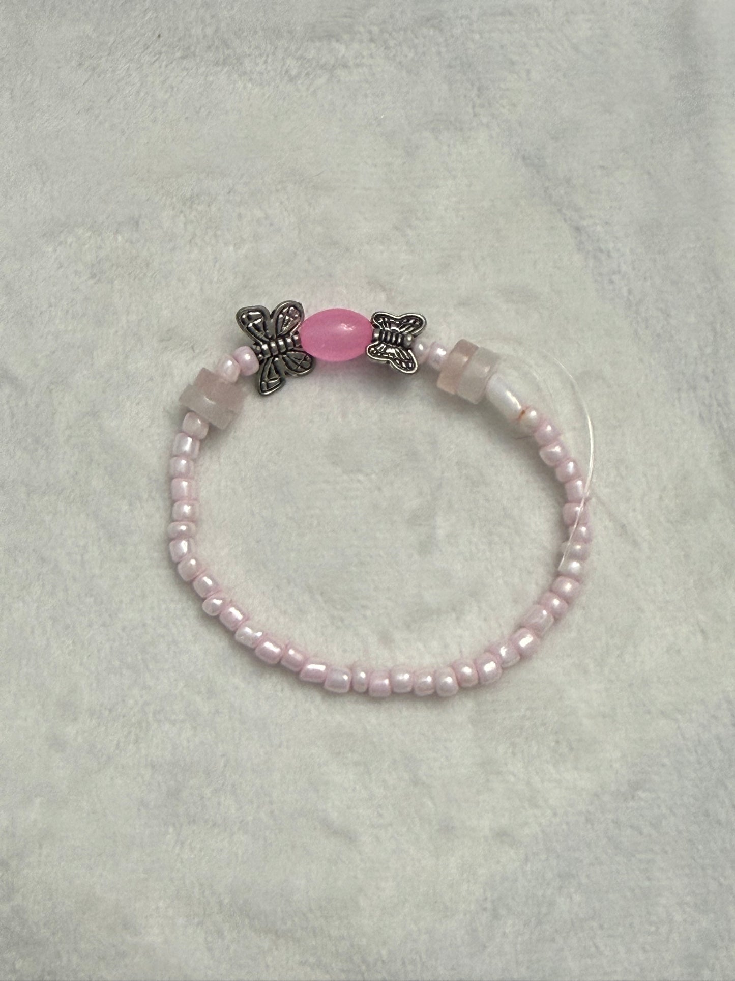 Butterfly pink seed bracelet