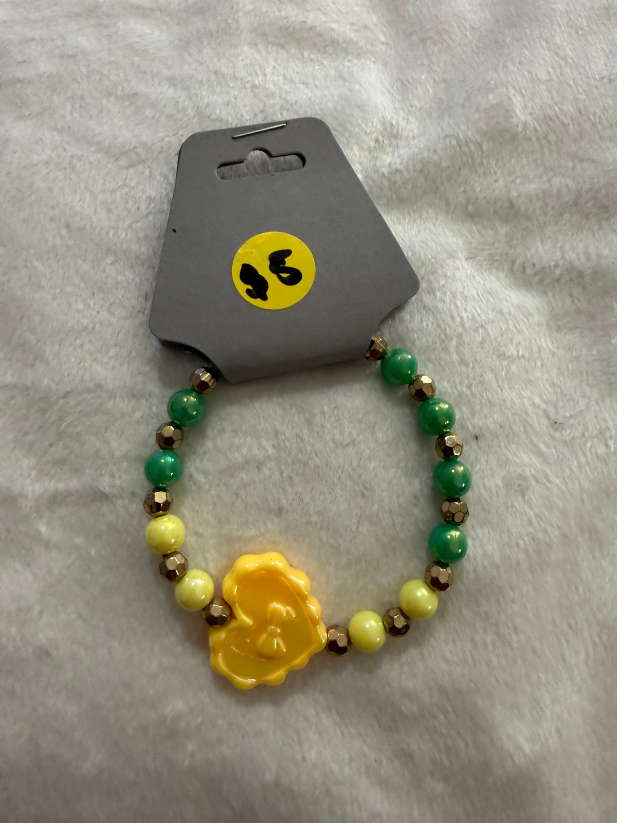 Yellow hearted charmed bracelet