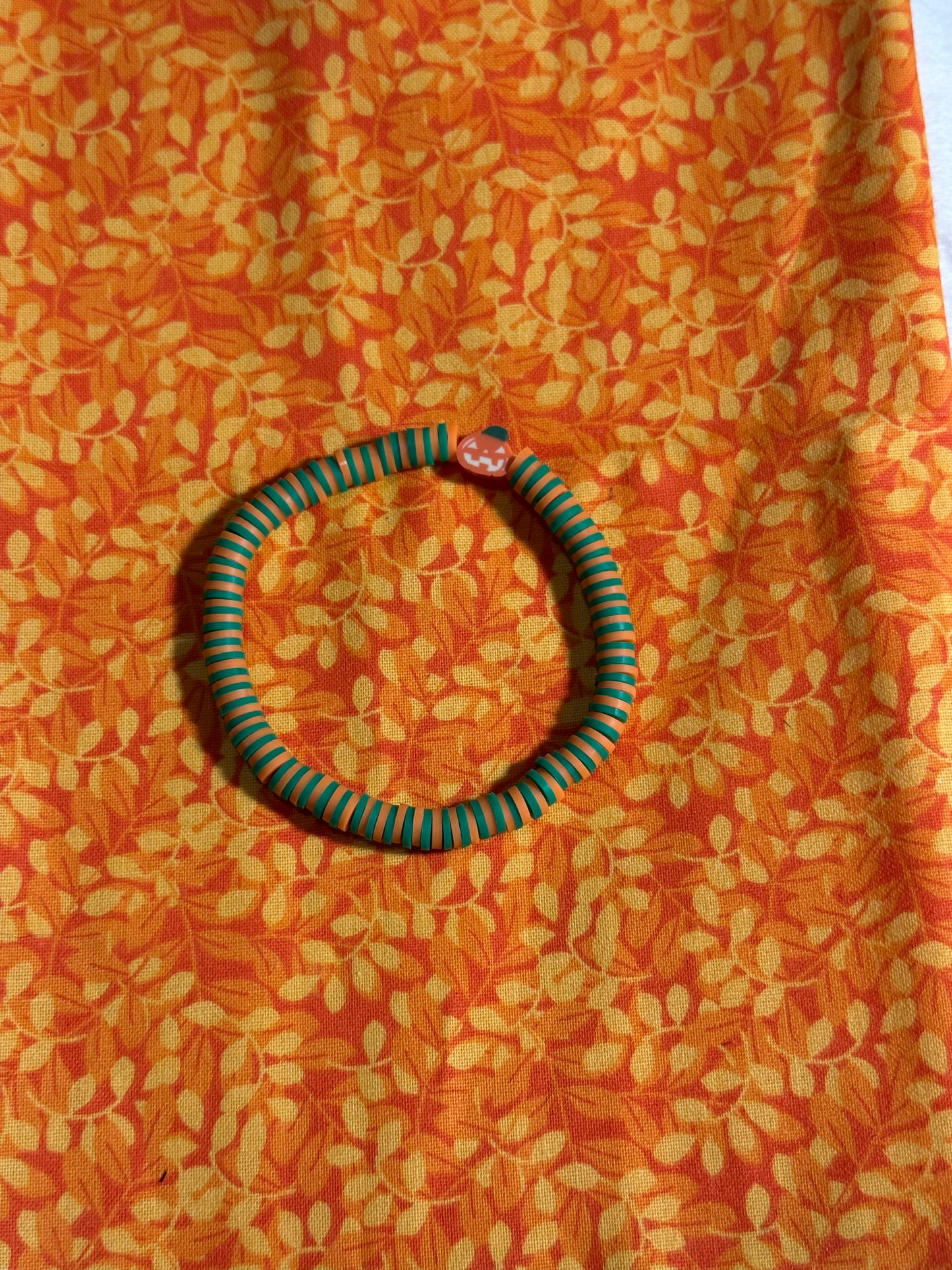 Orange green theme clay bracelet