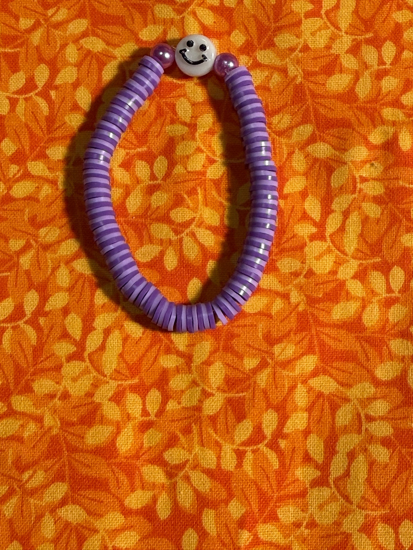 Purple smiley face bracelet