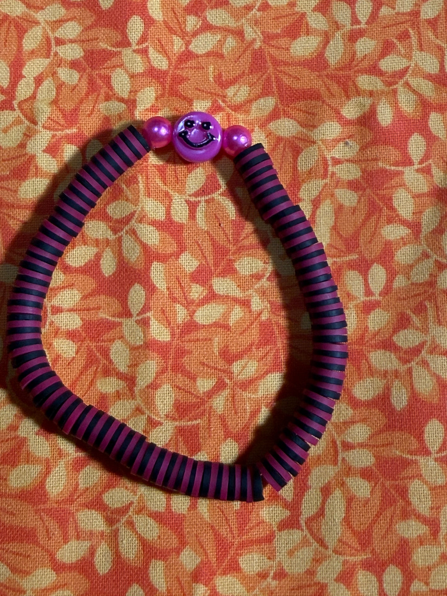 Pink smiley face clay bracelet